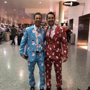 Flying home for the holidays dressed to surprise the family. Before the flight, I met this stranger at the airport. Instant best friends • r/pics