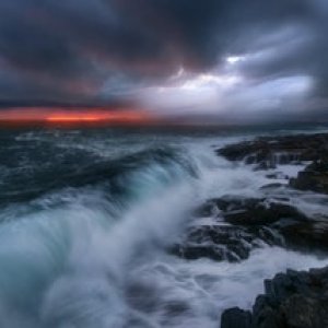 The biggest waves I've seen at Acadia National Park with incredible light from an exiting storm system (Maine, USA) [OC] [6792x4532] • r/EarthPorn