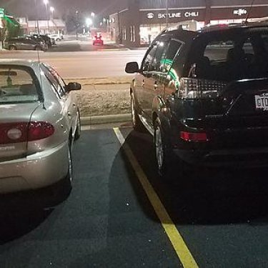 Was walking to my car when I noticed something peculiar about the guys license plate next to me compared to mine