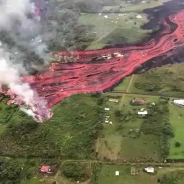 Travel Vault on Instagram: “Hawaii Kilauea Volcano Eruption  ⠀⠀⠀⠀⠀⠀⠀⠀⠀ Insane aerial footage shows lava crossing Poho’iko road through Lanipuna Gardens in #Hawaii. 4…”