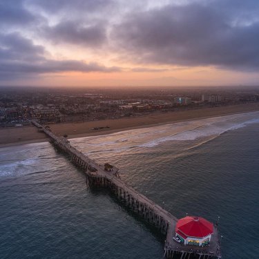 Micah Fitch on Instagram: “Day 15 #sunrise #huntingtonbeach #aerialphotography #pier #beachlife”