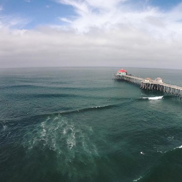Huntington Beach on Instagram: “Fun waves this morning with the @hurleysurfclub_ca crew:) Warm water with head high waves.  We meet Friday’s 7-9am on #SouthSide, come surf…”