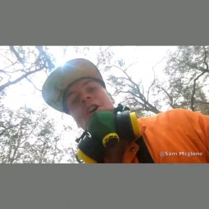 r/australia - Bloke finds a Joey whilst putting out fires, wholesome.