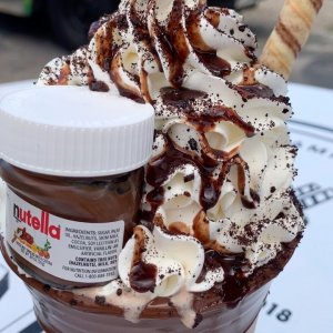 sweetportfolio✨miami food on Instagram: “????NUTELLA or S’MORES? I’m Nutella-ing you which one I chose????⁣ ⁣ ???????????????????????????? ???????????????????????????????????? topped with whipped cream, chocolate sauce, cookie…”