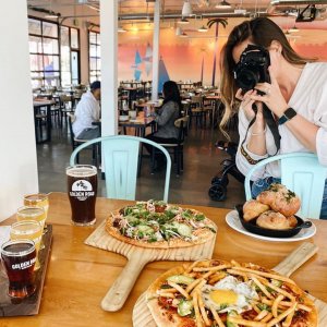 Visit Huntington Beach on Instagram: “Okay we’re hungry now...???? @goldenroadpubhb @peterslanding #SurfCityUSA ????: @raqueldorsey”